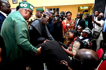 Photos: Tinubu with some victims of Agwan Rukuba massacre