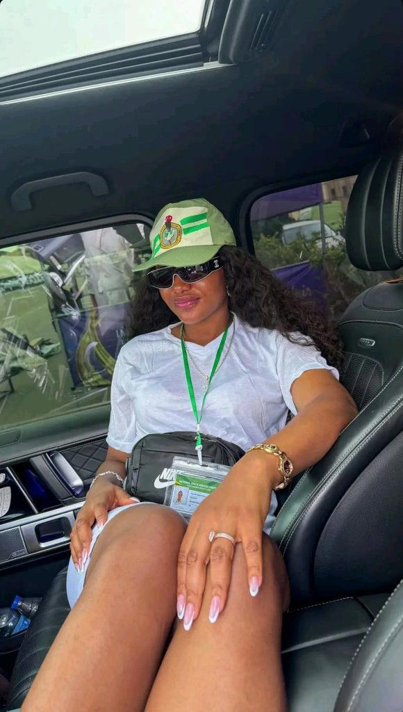 BBNaija's Chomzy Sparks Outrage for Remaining Seated in Vehicle During NYSC Ceremony