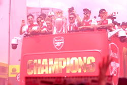 Photos: Arsenal fans troop out for EPL trophy parade despite UCL setback