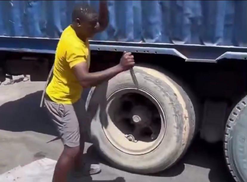 Video: Man escapes death after attempts to burst truck tyre