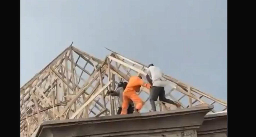 Video: Two construction workers fall from rooftop during site fight, one feared dead