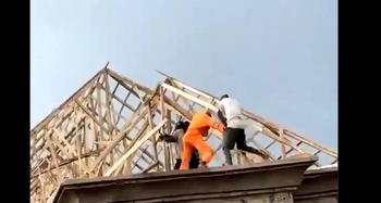 Video: Two construction workers fall from rooftop during site fight, one feared dead
