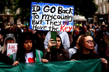 Thousands turn out for anti-racism rally after Belfast unrest