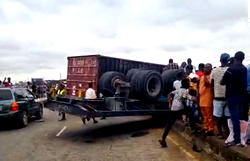 Tragedy as truck driver dies, motor boy rescued in Lagos crash