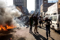 Looting, arrests follow South Africa’s anti-immigrant protests