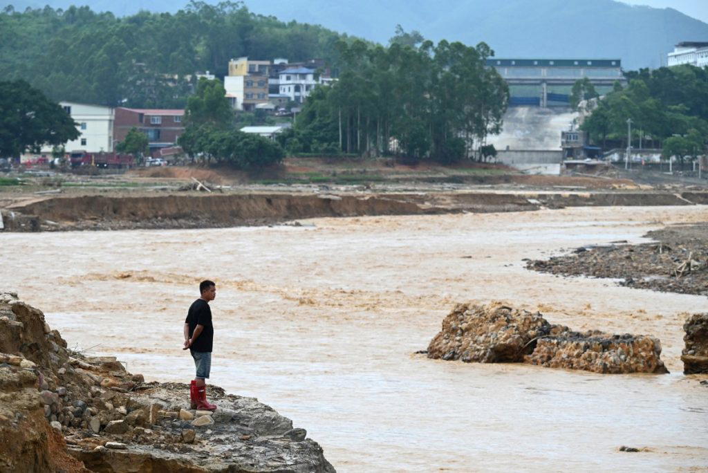 China storms leave 17 dead as rescuers search for survivors