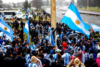 Argentina squad returns, without Messi, after World Cup final loss