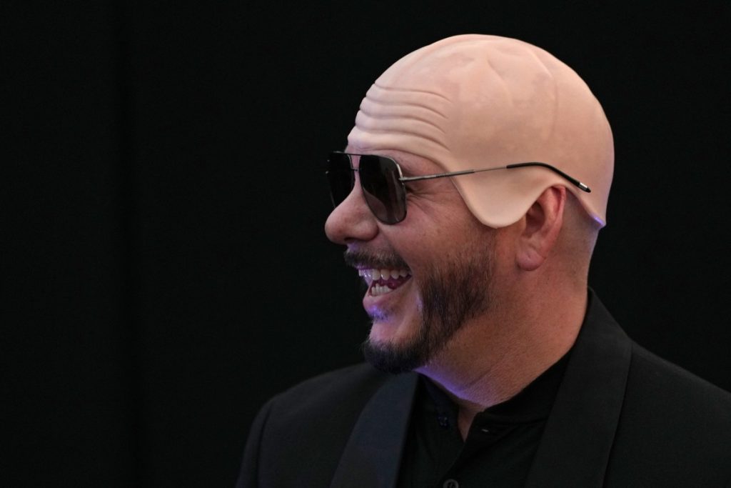 Pitbull achieves world record for bald cap at London performance