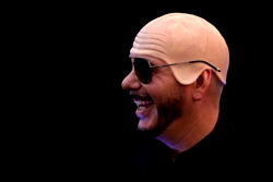 US rapper Pitbull sets bald cap world record at London show