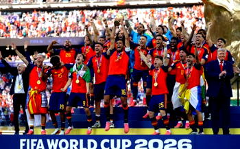Trump lingers on stage to lap up World Cup spotlight