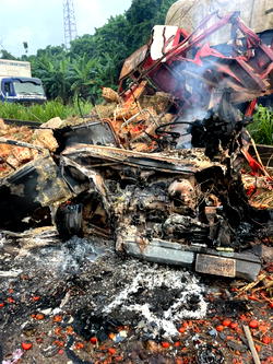 Two killed as truck, bus collide, burst into flames in Ogun