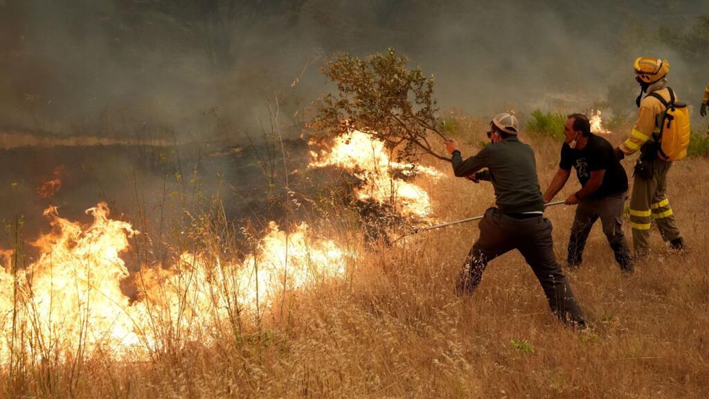 Spain battles raging wildfires near Madrid to protect lives