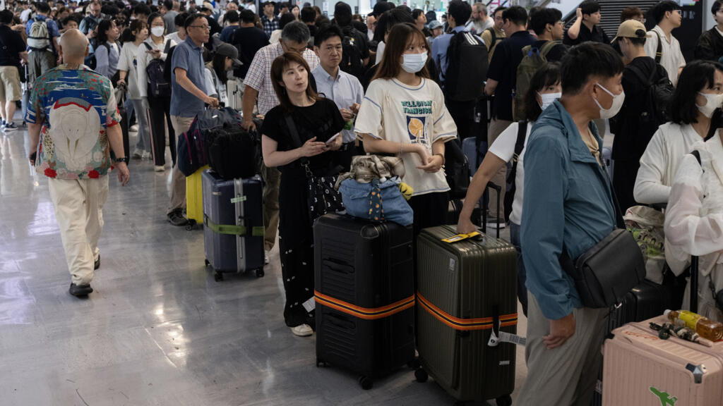 Thousands stranded as heavy rain kills at least four in Japan