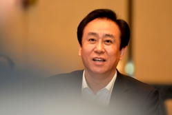 China jails Evergrande founder for life, fines firm over $2bn