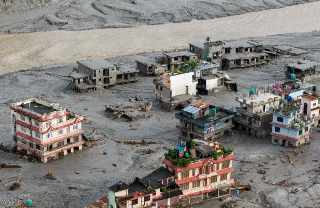 Nepal-Tibet floods leave at least 180 dead, over 1,300 missing