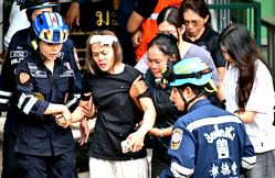 Teen kills grandparents, six others in Thailand school shooting