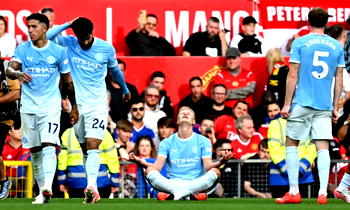 Haaland fires 10-man Man City to famous win at Man Utd