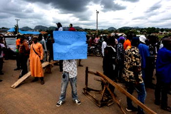 AAUA students block highway, protest 68-day ASUU strike