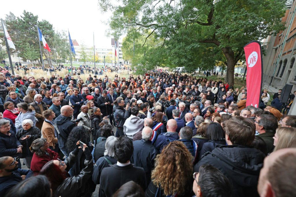 Protests banned in parts of Paris as Macron swipes at Trump