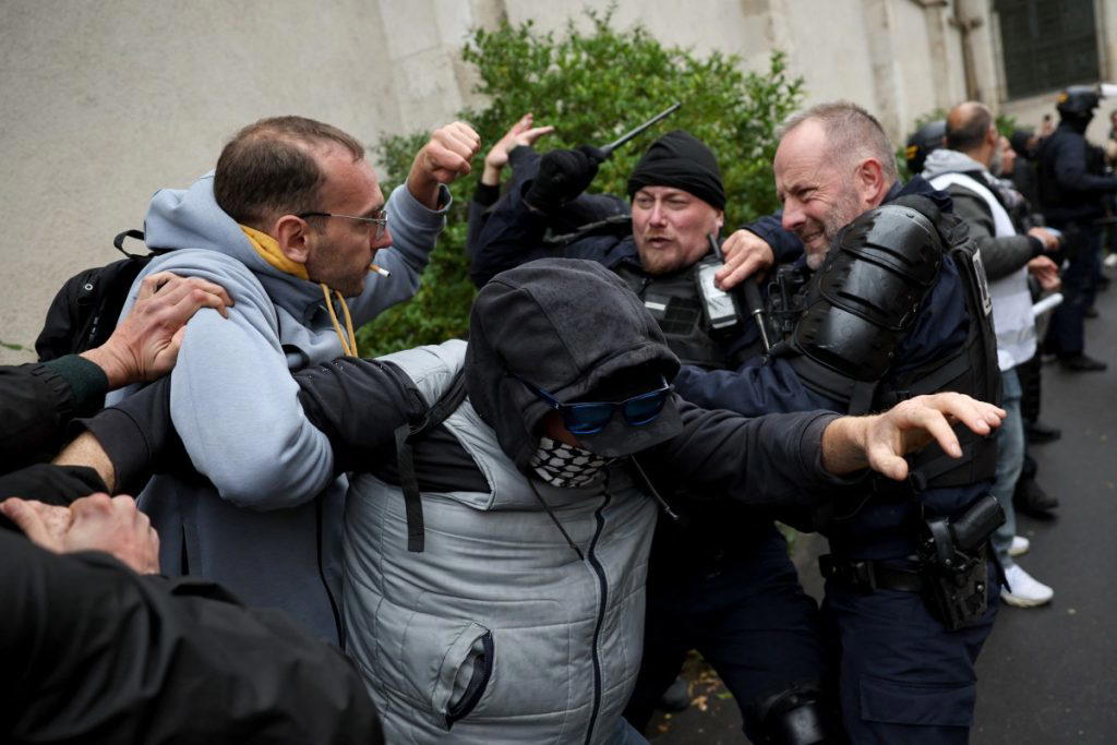 Clashes break out in Paris and other French cities amid fresh protests